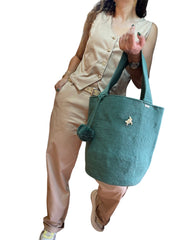 Backpack with Pin and Tassels